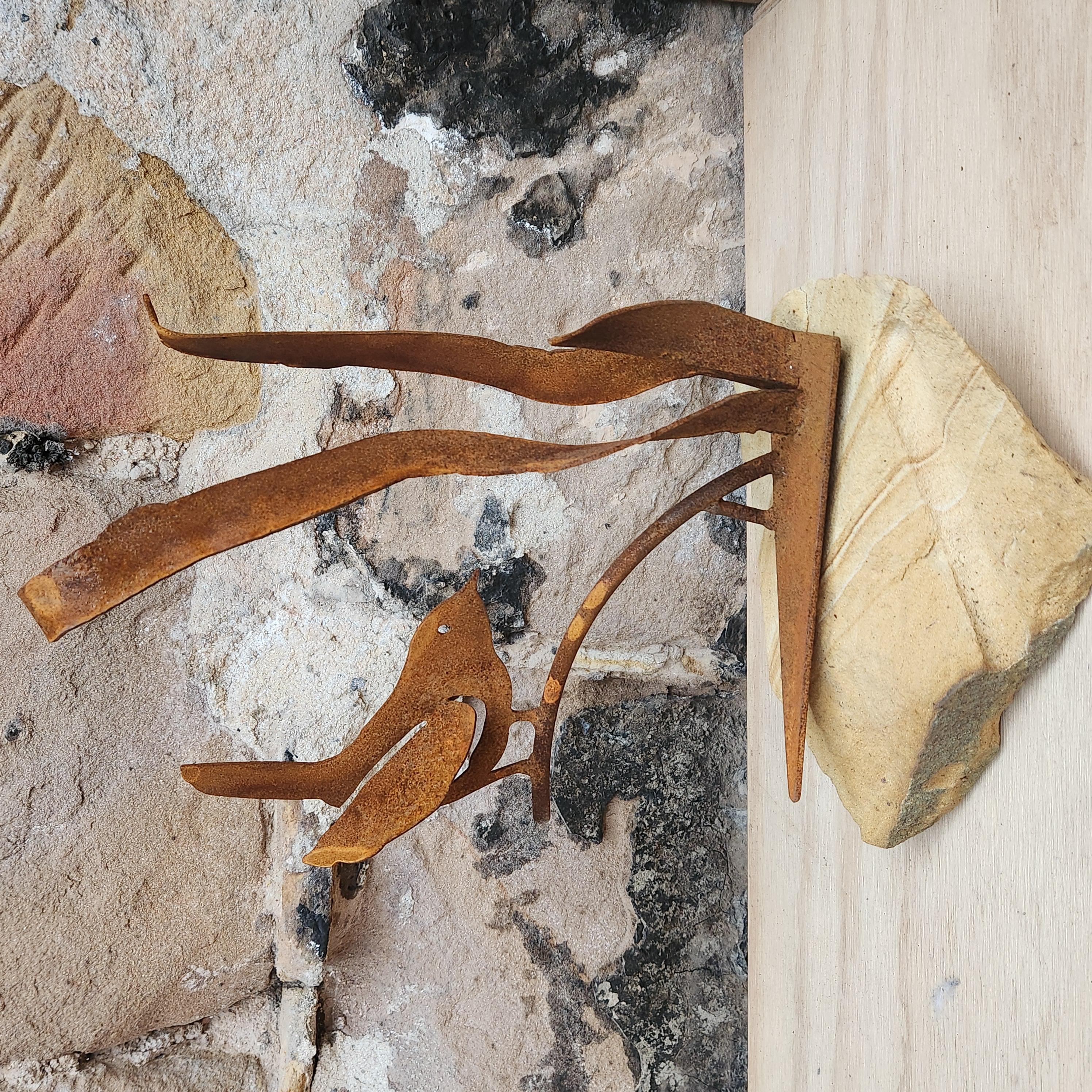 Mini Corten Steel Bird on Sandstone