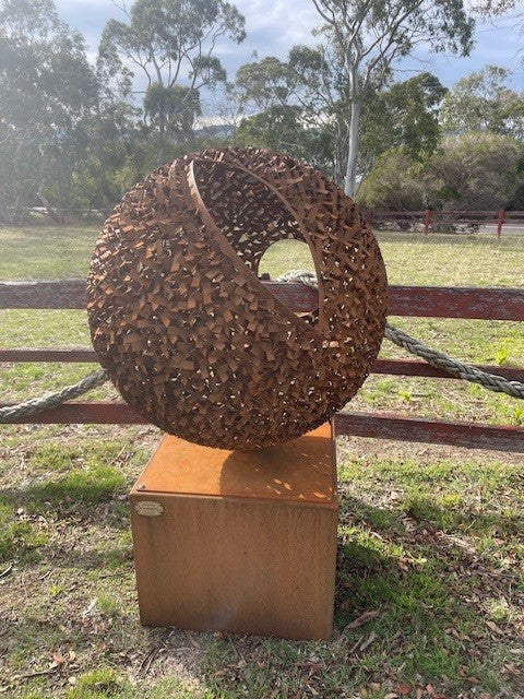 Sphere (with Cut Outs) on Square Plinth